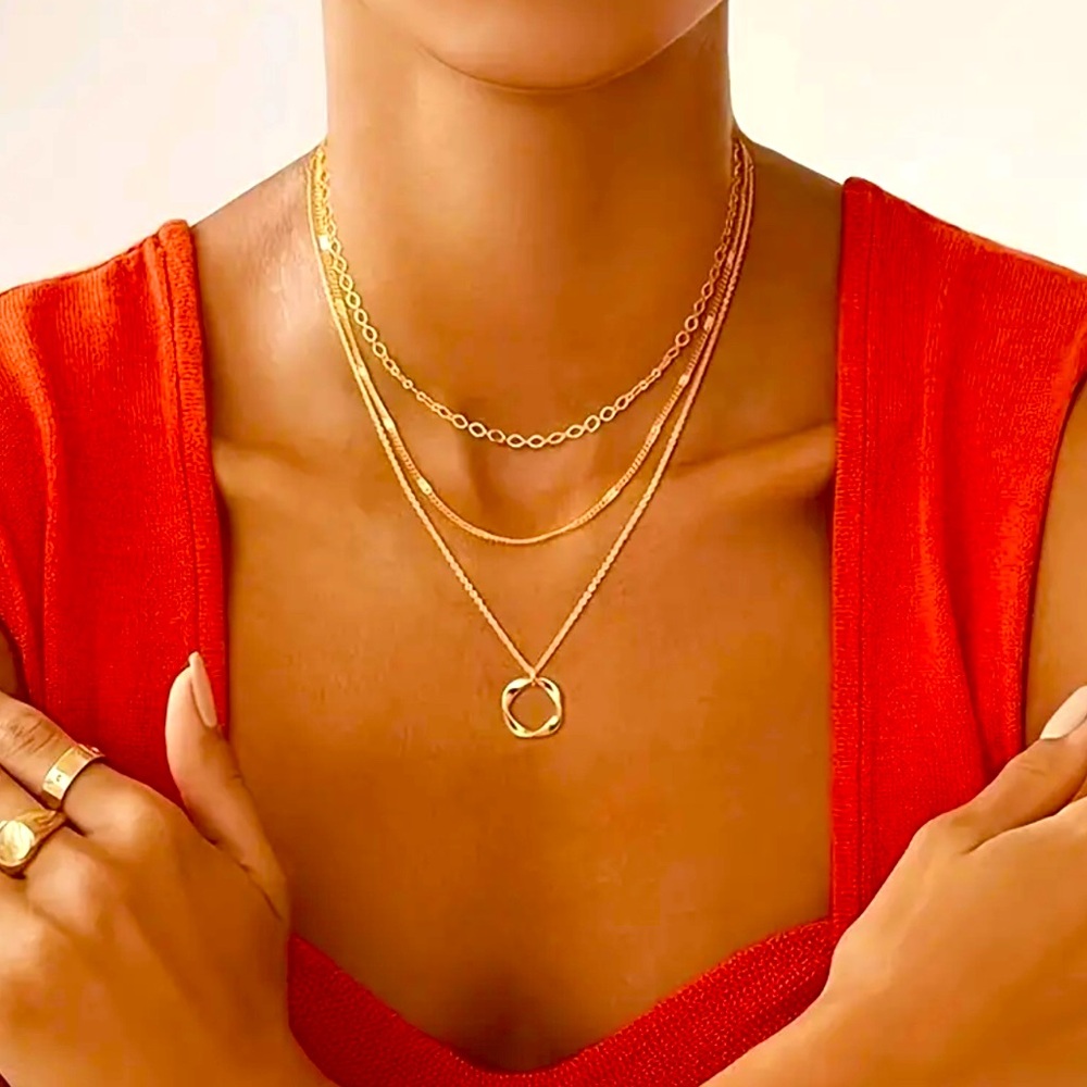 3 Layered Gold Plated Necklace w/Circular type Pendant.